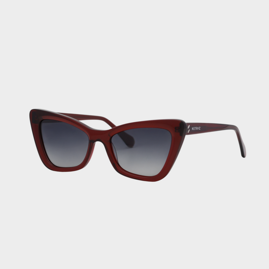 NETRAZ NZ4228 Red Cat Eye Sunglasses With Red Frame And Black Gradient Lens Angle View